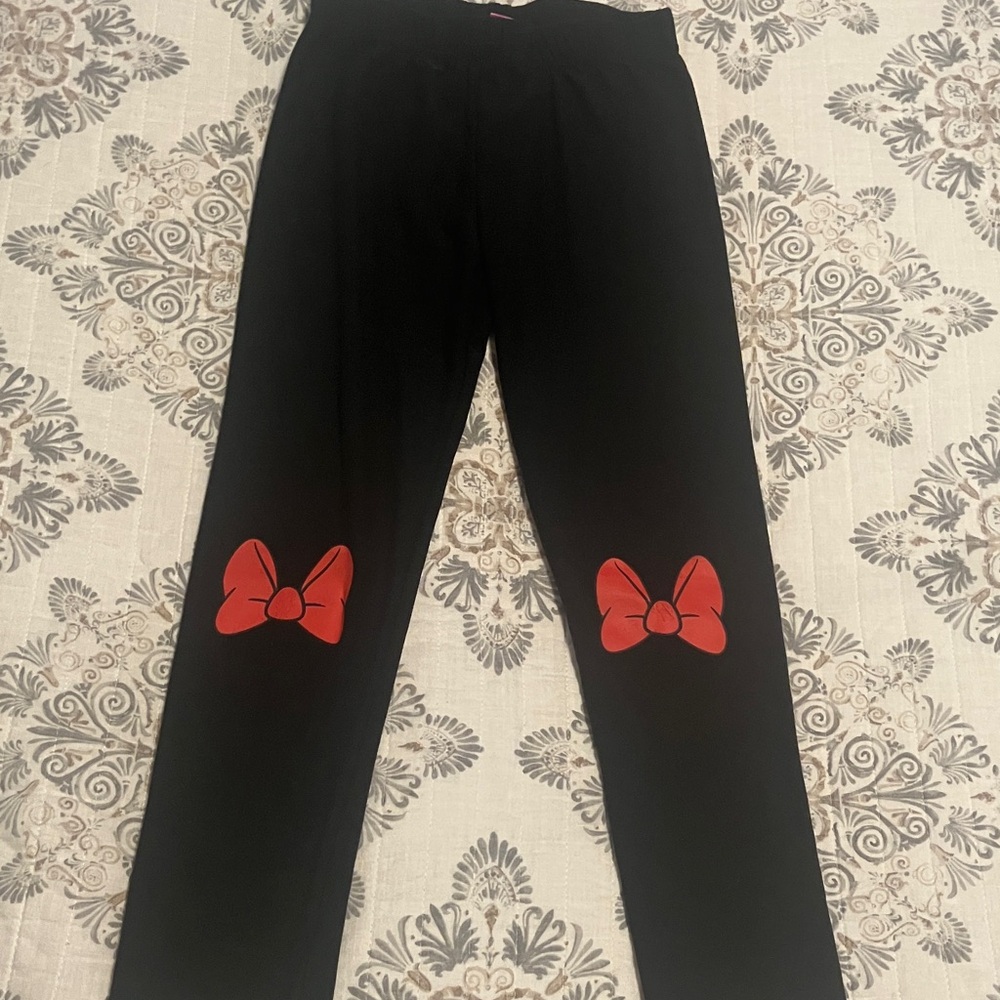 Minnie! Girls Black Leggings with Red Distressed Bow Accents.